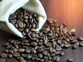 Coffee beans out of sacks on the table