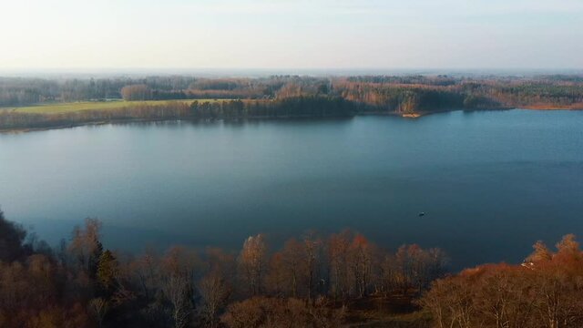 Old Red Brick House, Katvari Manor in Latvia and Katvaru Lake in the Background. View From Above. In the Manor Territory Is a Big Park With Hundred-year Old Linden. Aerial Dron Shot 4K Resolution
