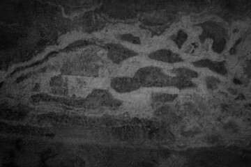Art black concrete stone texture for background in black. Abstract vintage cement and sand grey dark detail covering.