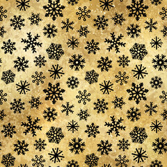 Vector Winter Snowflakes Golden Seamless Pattern. Christmas hand drawn snow print on shiny yellow gold foil background. New year luxury texture for print, wrapping paper, decor, gift, backgrounds