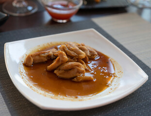 Asian dish with chicken and Teriyaki sauce at the restaurant