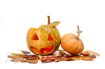 A pumpkin lantern, a Halloween attribute resembling a head with a frightening or funny face, shot against a white background.