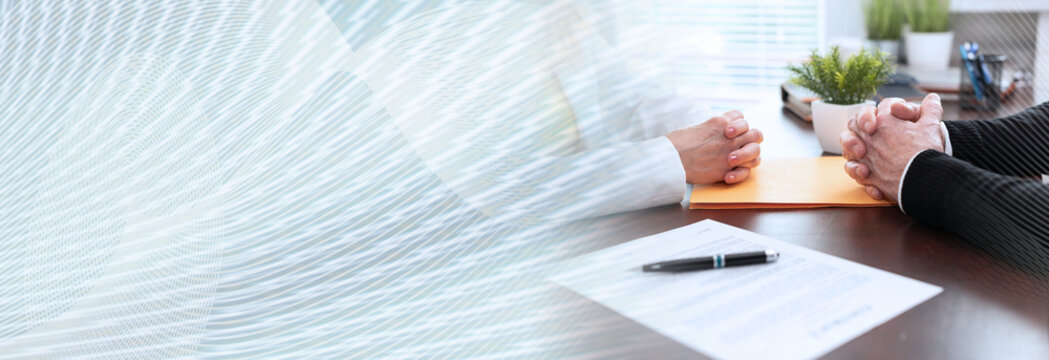 Business negotiation between businesswoman and businessman (lorem ipsum text used); panoramic banner