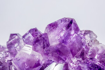 Amethyst purple crystals. Gems. Mineral crystals in the natural environment. Texture of precious...