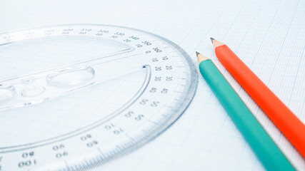 High angle close up view of ruler and pencil on paper