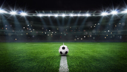 textured free soccer field in the evening light - center, midfield with the soccer ball © Igor Link