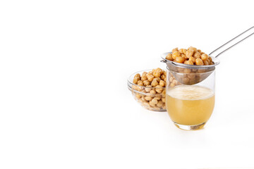 Chickpea water aquafaba isolated on white background. Copy space. Chickpea water is a substitute for eggs in pastries	