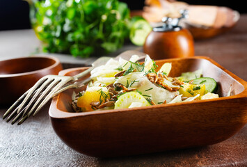 Green vegan salad with sunflower seeds. Healthy vegetarian food concept.