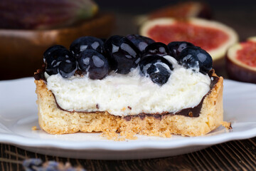 tartlet with cream and blueberries