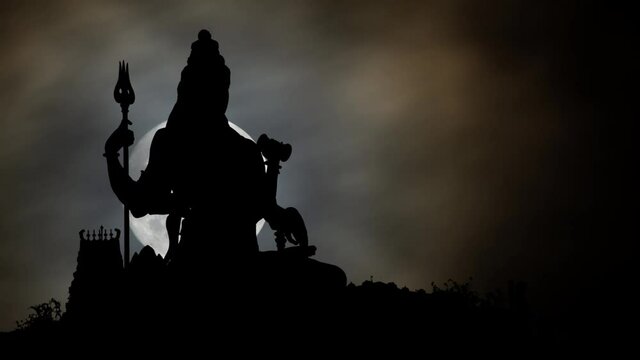 Hinduism: Lord Shiva God in Silhouette, Time Lapse by Night with Full Moon