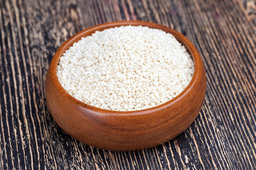 white sesame seeds on a wooden table