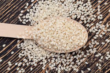 white sesame seeds on a wooden table