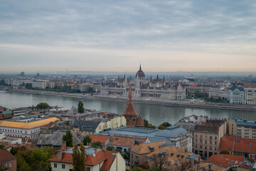 view of the city on the banks of the Danube river with the parliament of budapest in hungary