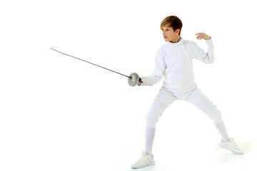 Boy fencer standing in attacking pose