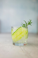 cocktail drink alcoholic with green cucumber and tonic
