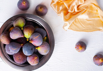 Portion of fresh Figs on light background