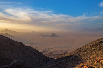 Naklejka premium Dust storm in the Namib desert at sunset