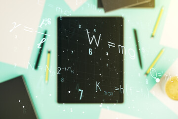 Creative scientific formula hologram and modern digital tablet on background, research concept. Multiexposure