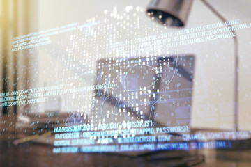 Creative code skull hologram on modern computer background, cybercrime and hacking concept. Multiexposure