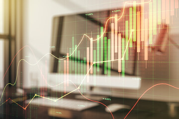 Double exposure of abstract creative financial diagram on modern laptop background, banking and accounting concept