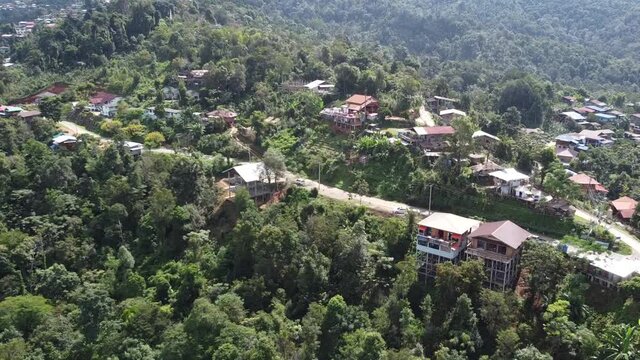 4K skyscape of Doi Sakad mountain valley in Pua, Nan Province, Thailand during rainy season. VDO from aerial view by drone