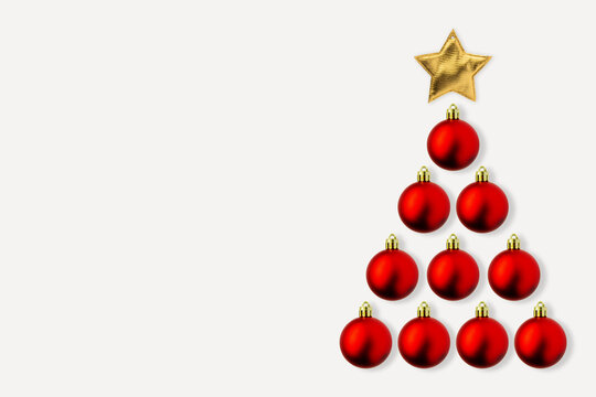 Christmas Tree From Red Bauble And Golden Star On White Background