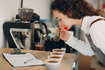 Cup Taster Girl Tasting Degustation Coffee Quality Test. Coffee Samples Cupping Test Taste - 466685918