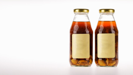 Health nourishment drink of organic ginkgo herb and natural longan flavor extract as invigoration nutrient liquid in glass bottle
