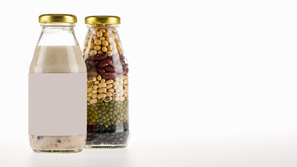 Supplementary organic bean extract milk in amazing drink glass bottle for nourishment beverage as tasty dessert and health therapy for vegetarian