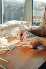 Knitting.Recycling, environmental friendliness, zero waste, recycling,  friendly,Knitted sweater and threads for knitting from yarn, Cozy knitting, small business