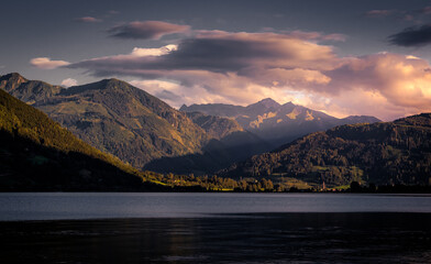 Huge dramatic cloud over the Austrian Alps at Zell am See during a hot summer day