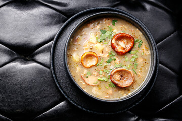 Mushroom soup.
A tasty dish.Culinary photography. Suggestion to serve the dish.