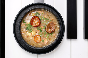 Mushroom soup.
A tasty dish.Culinary photography. Suggestion to serve the dish.