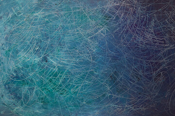 Fondo materico graffito in superficie e dipinto a tempera di colore verde-azzurro e blu; spazio per testo