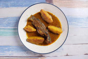 delicious Bengali style tangra fish curry