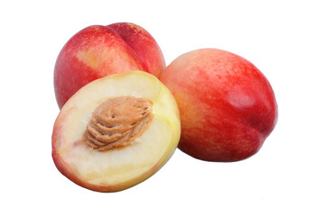 three ripe juicy nectarines on a white isolated background