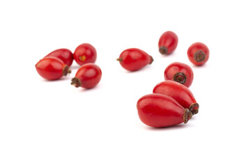 The rosehip isolated on white background. Fresh raw berries