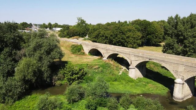 Aerial view of Nineteenth-century bridge over the Yantra River, known as the Kolyu Ficheto Bridge in Byala, Ruse region, Bulgaria