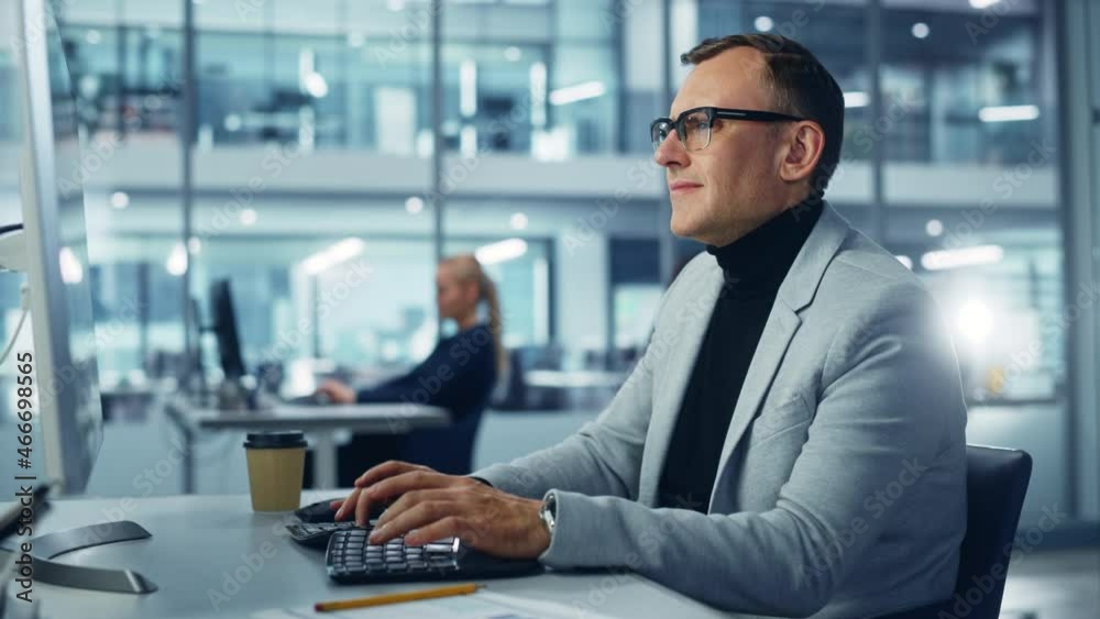 Poster diverse corporate office: stylish handsome big data engineer using desktop computer, screen showing 
