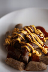  Keropok Lekor or fish sausage made up from fish and sago flour and seasoned with salt and sugar.