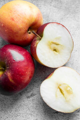 Red apples on a gray background. healthy eating