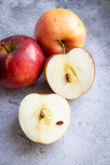 Red apples on a gray background. healthy eating