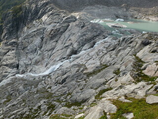 Melting water lake with the spring of River Rhone, Gletsch, Obergoms, Wallis, Valais, Switzerland
