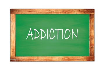 ADDICTION text written on green school board.