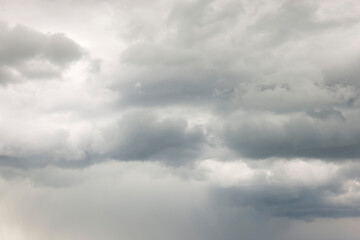 Naklejka na ściany i meble Overcast grey sky with clouds