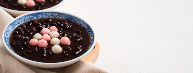 Red and white tangyuan with red bean soup.