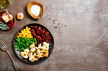 Obraz na płótnie Canvas ingredients for chilli corn carne: bean, corn, other vegetables