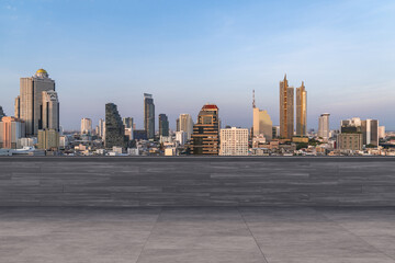 Panoramic Bangkok skyline view, concrete observatory deck on rooftop, sunset. Luxury Asian corporate and residential lifestyle. Financial city downtown, real estate. Product display mockup empty roof