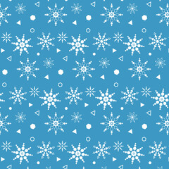 Seamless vector pattern of snowflakes on a blue background