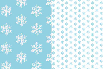 White and blue snowflakes on a white-blue background. Christmas or New Year pattern. Winter decor element. Place for your text.
